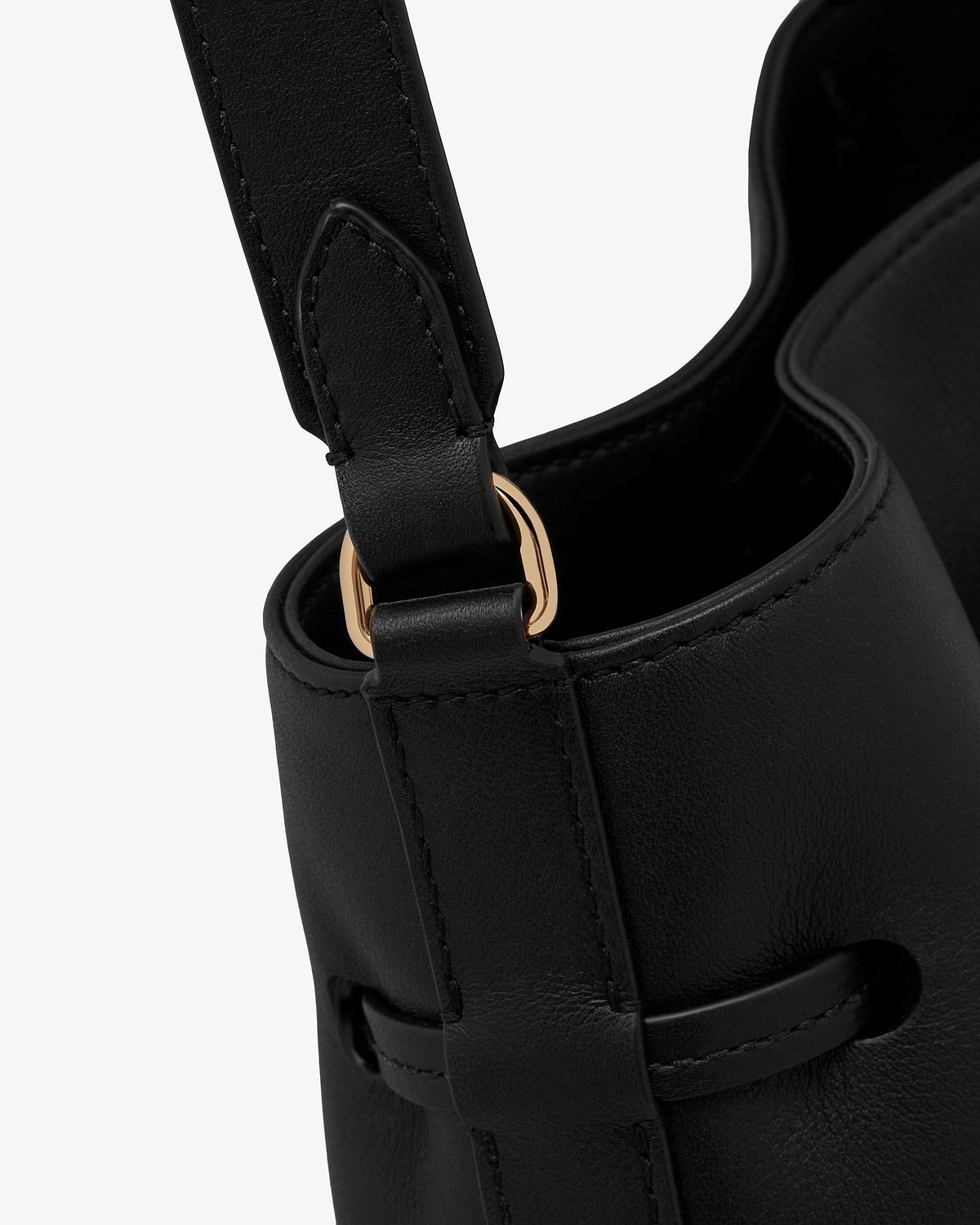 Black leather bucket bag strap and gold-tone ring with stitched detailing.