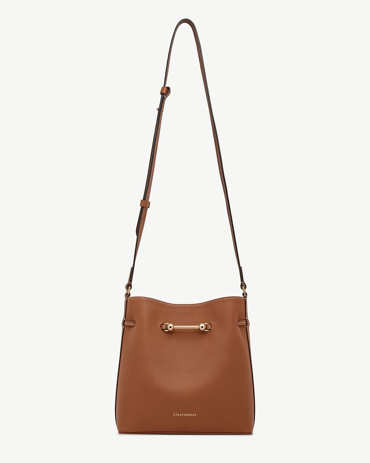 Chestnut Strathberry Corda bucket bag with adjustable strap and gold bar hardware