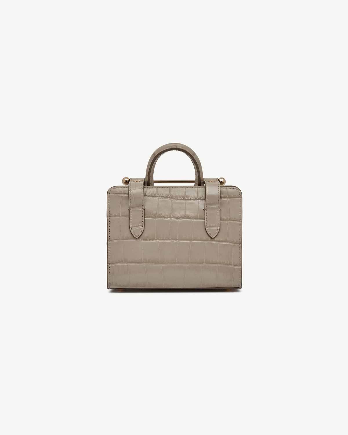 Nano tote in croc-embossed leather with top handles and gold-tone hardware.