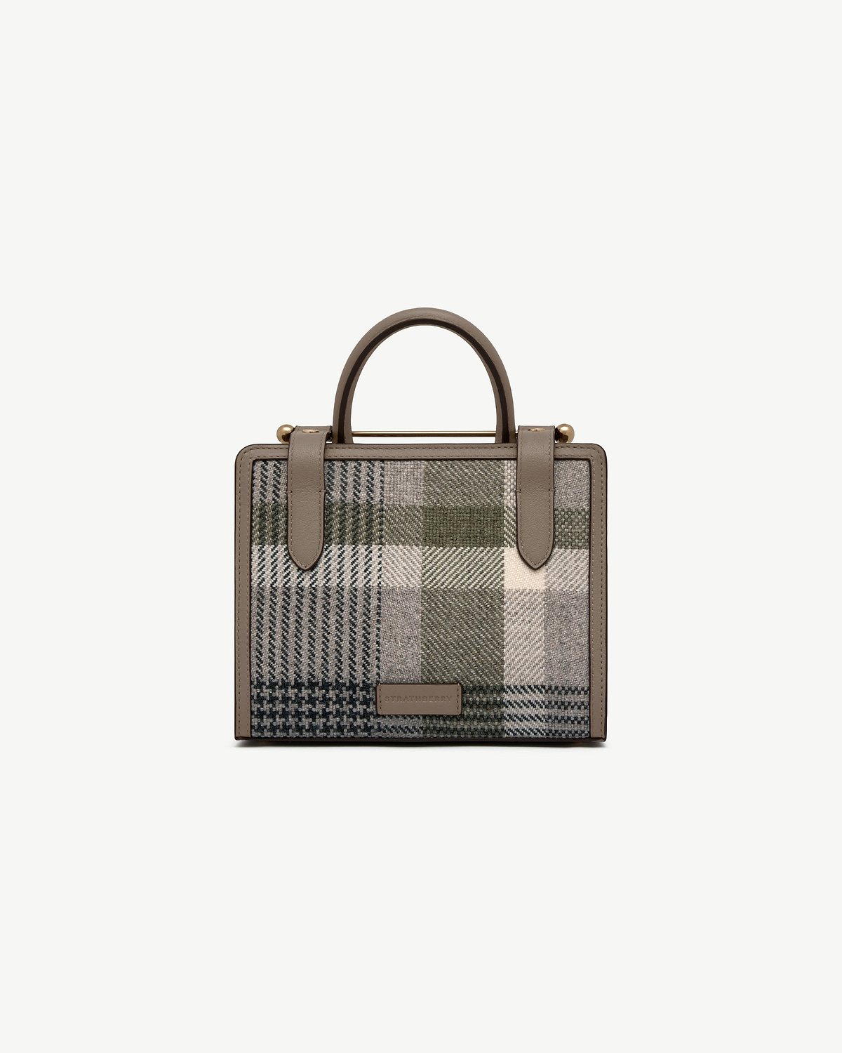 Strathberry mini tote in tartan taupe with top handles and leather trim.