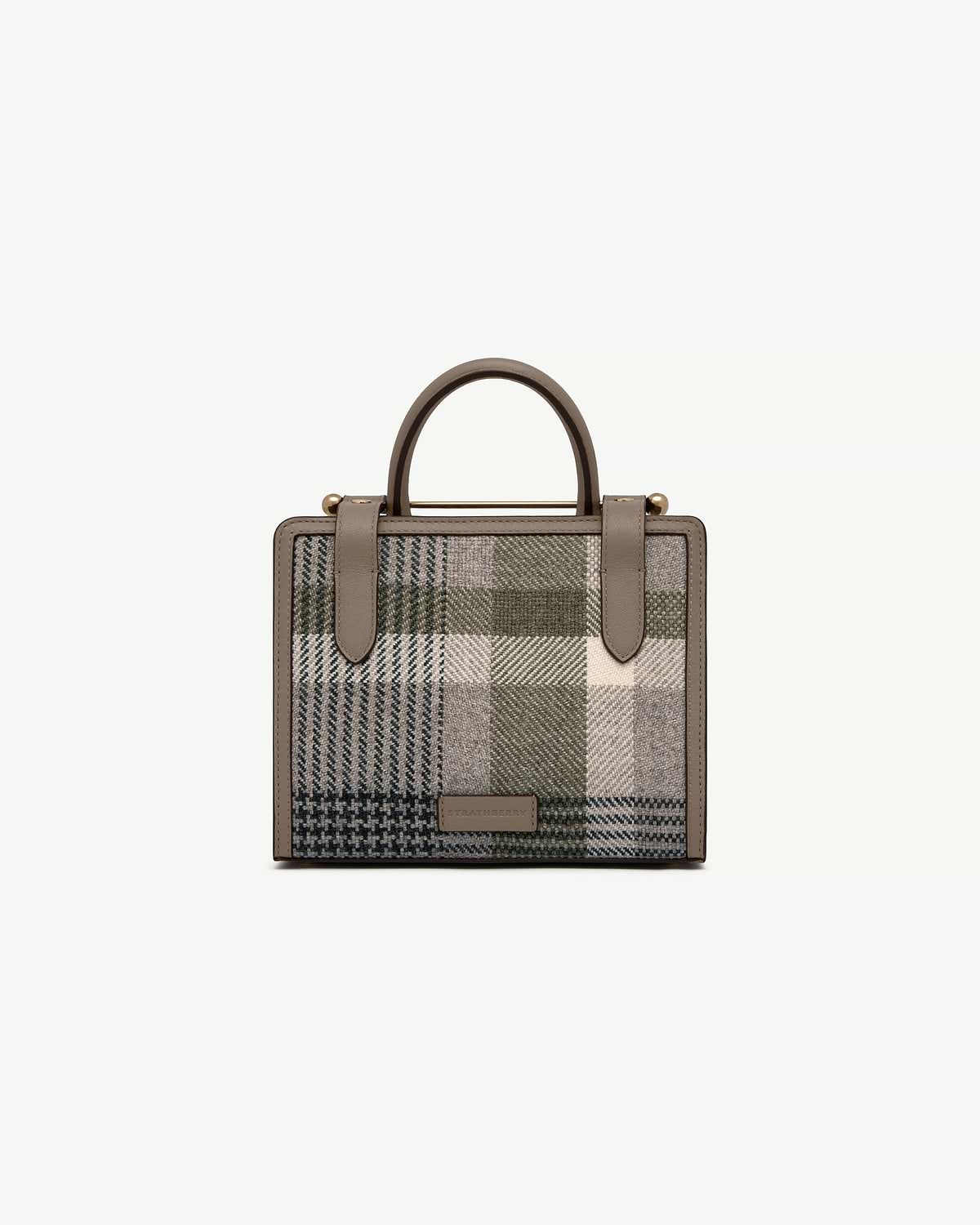 Strathberry mini tote in tartan taupe with top handles and leather trim.
