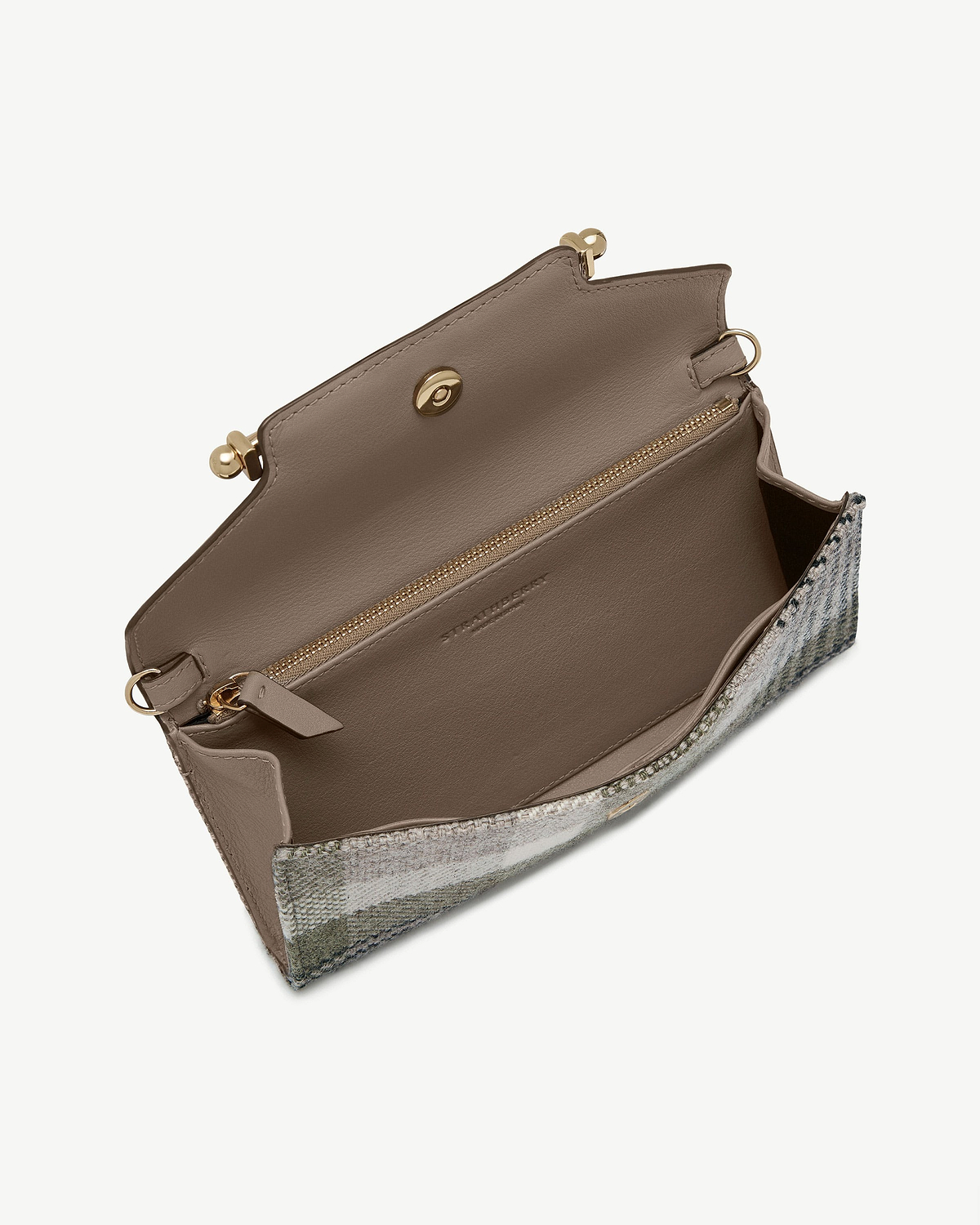 Open Strathberry Multrees chain wallet in tartan taupe showing internal zip pocket and snap closure