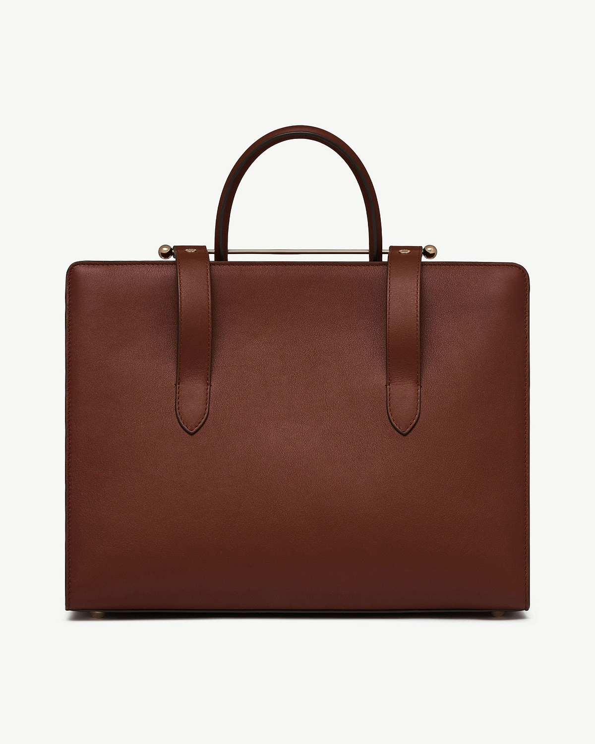 Walnut leather tote with double top handles and structured rectangular body.