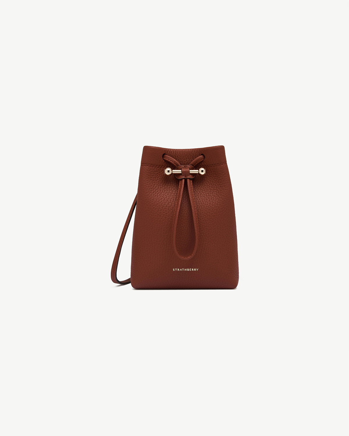 Strathberry Osette midi pouch in walnut leather with drawstring and gold bar.