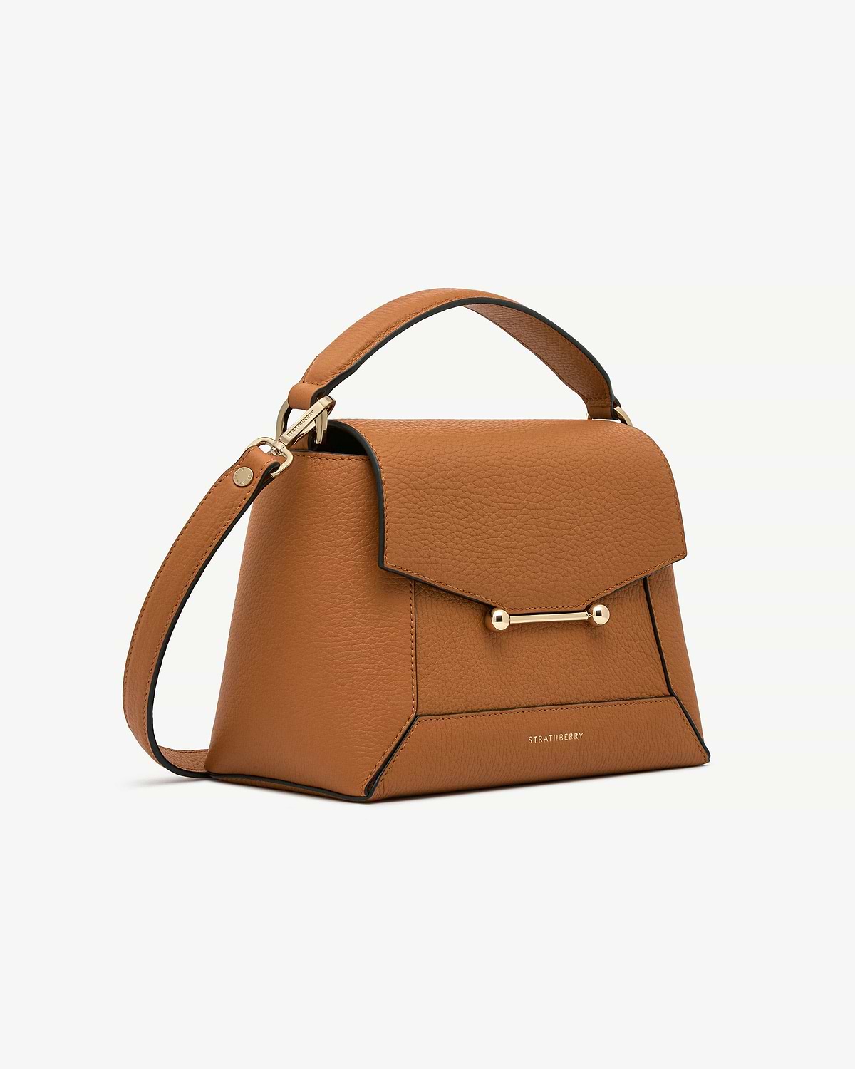 Honey pebbled leather mosaic bag with top handle, gold bar and Strathberry logo.
