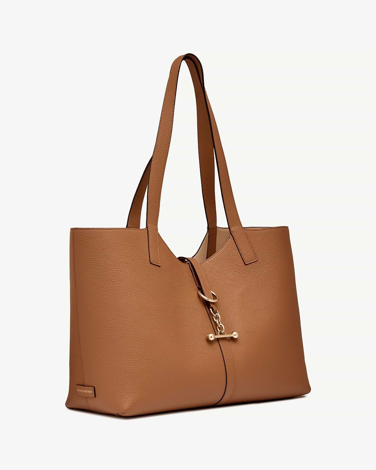 Strathberry Kite tote in tan grained leather with gold chain fastener.
