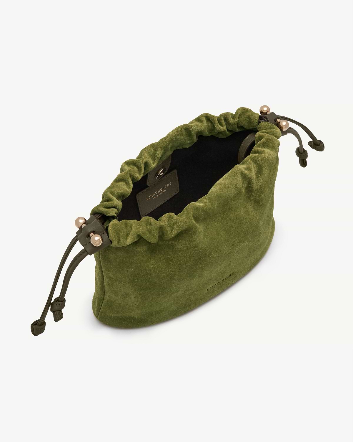 Lime suede Charlotte drawstring bag with khaki drawcords and Strathberry label inside.