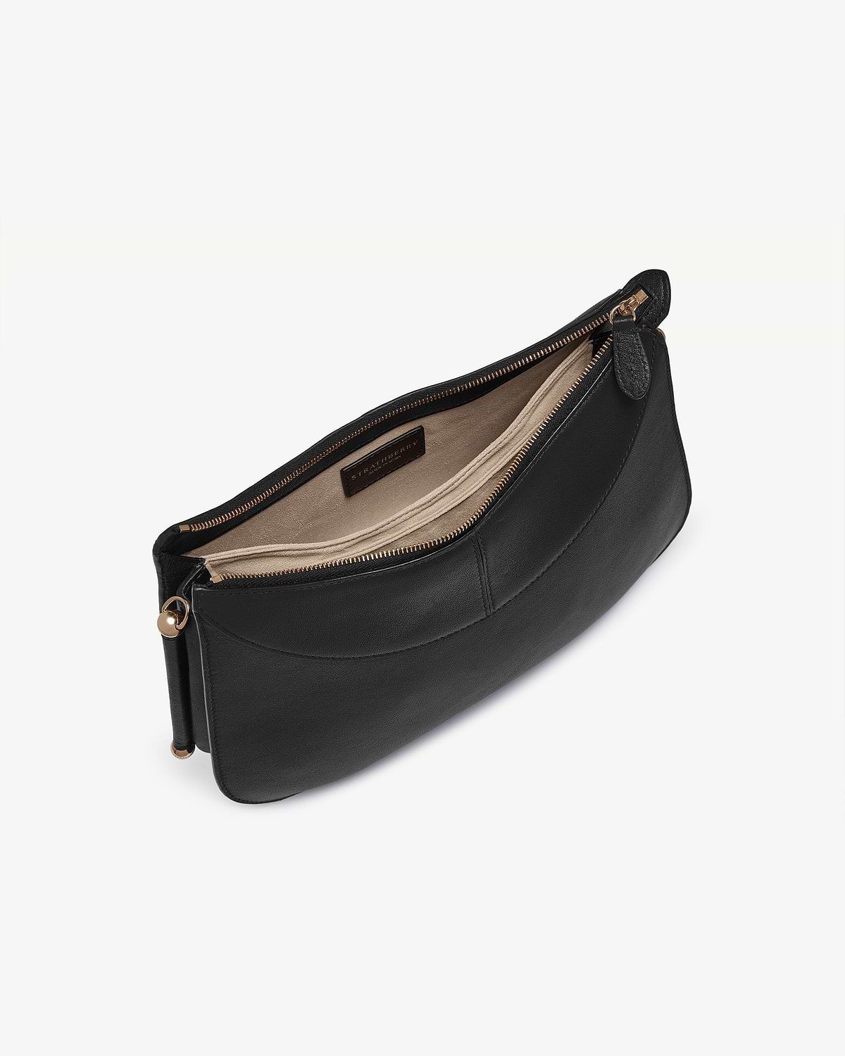 Black Nest Shoulder bag with open top zip, beige interior and Strathberry label.