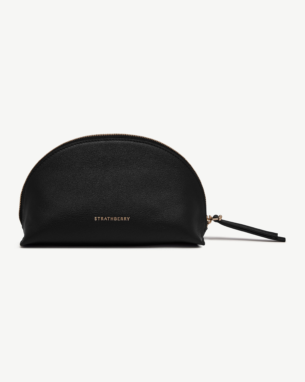 Black Strathberry leather Nest Pouch with gold logo and tassel zip.