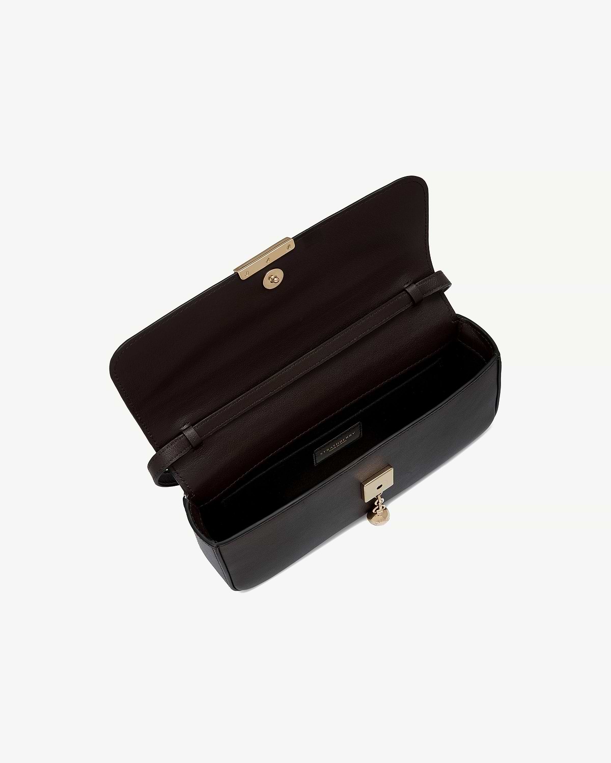 Espresso Strathberry clutch open showing interior, strap and gold push-lock hardware.
