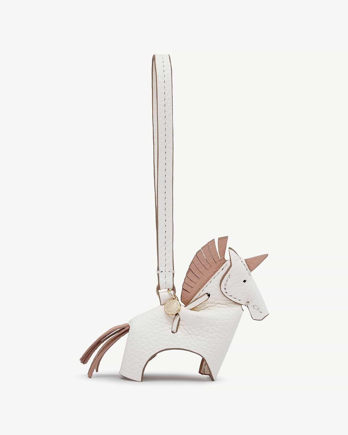 White and peony leather unicorn bag charm with strap and tassel.