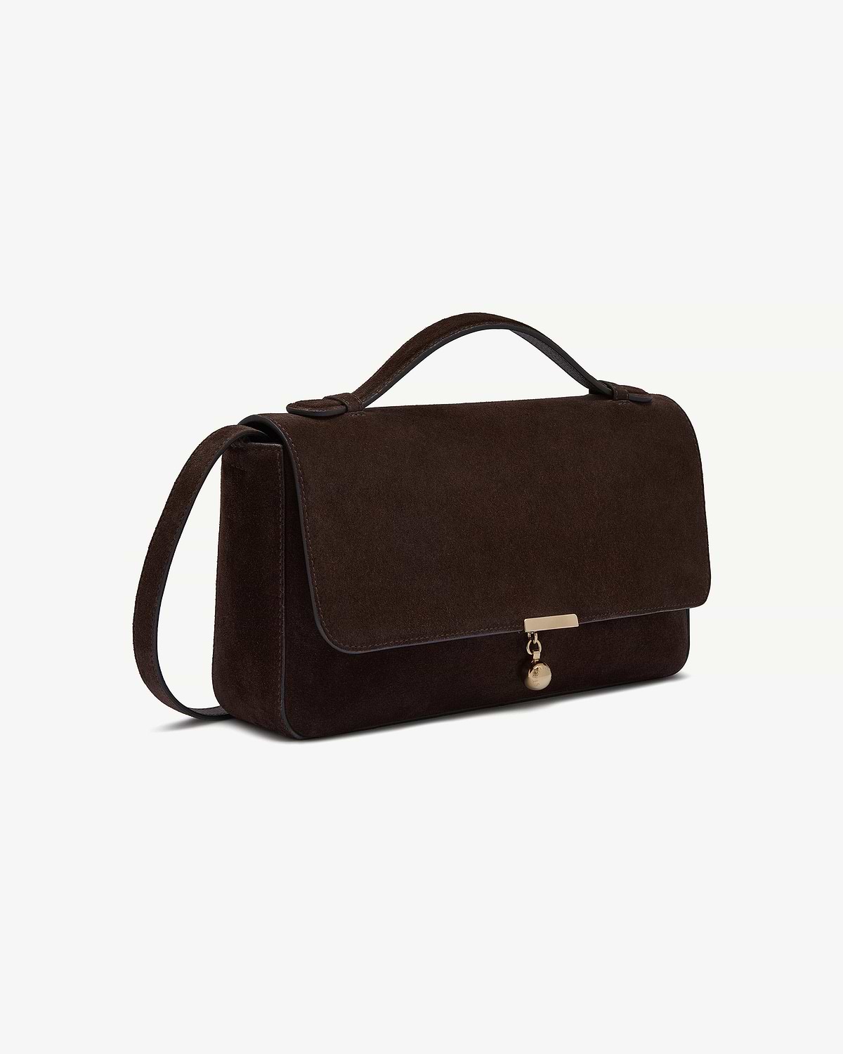 Espresso suede flap bag with top handle, shoulder strap and gold charm.