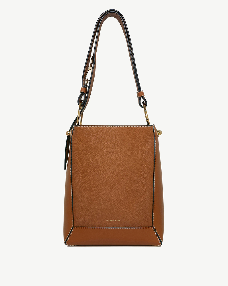 Tan Strathberry Lana midi bucket bag with vanilla contrast stitching.