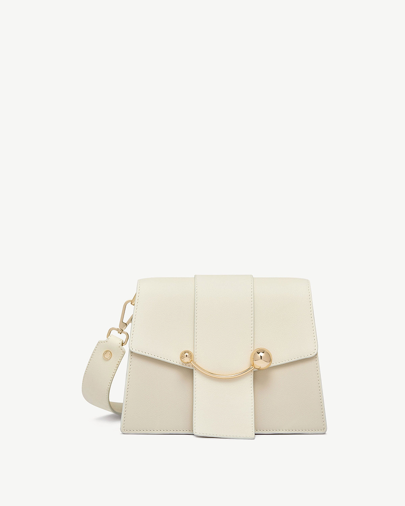 Vanilla and diamond leather box crescent bag with gold curved bar and shoulder strap.