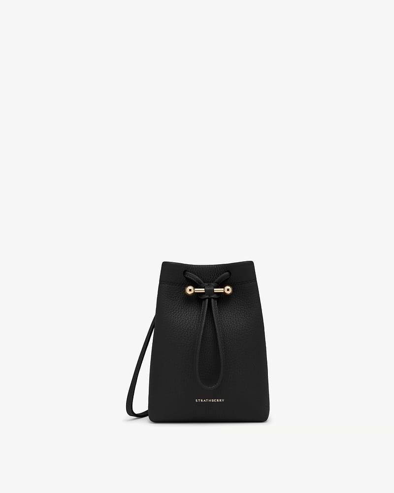 Black Strathberry Osette midi pouch with drawstring fastening and gold hardware.