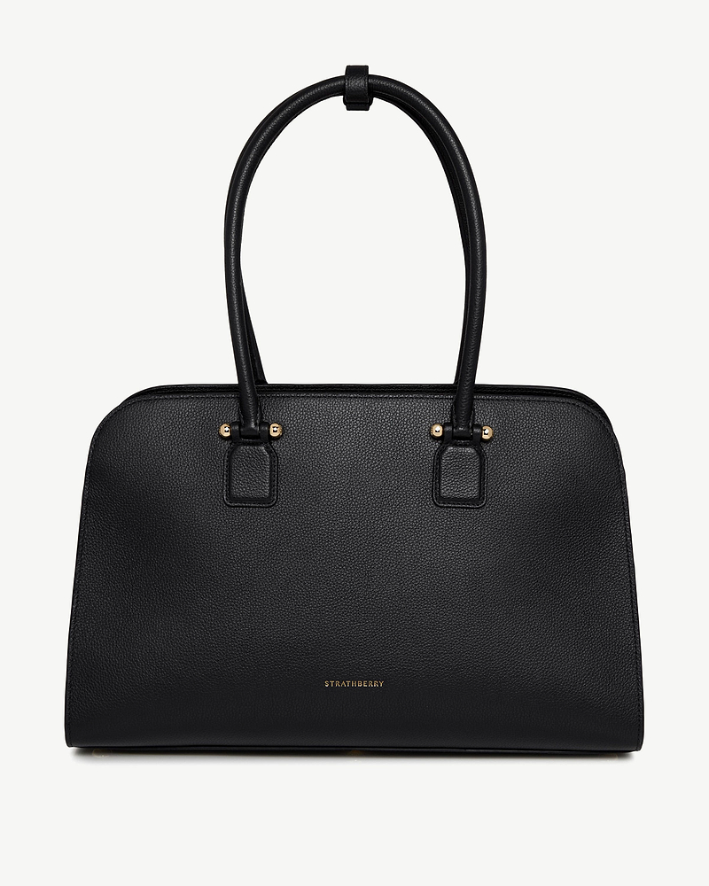 Black Strathberry Georgia Maxi leather tote with two top handles and gold hardware.