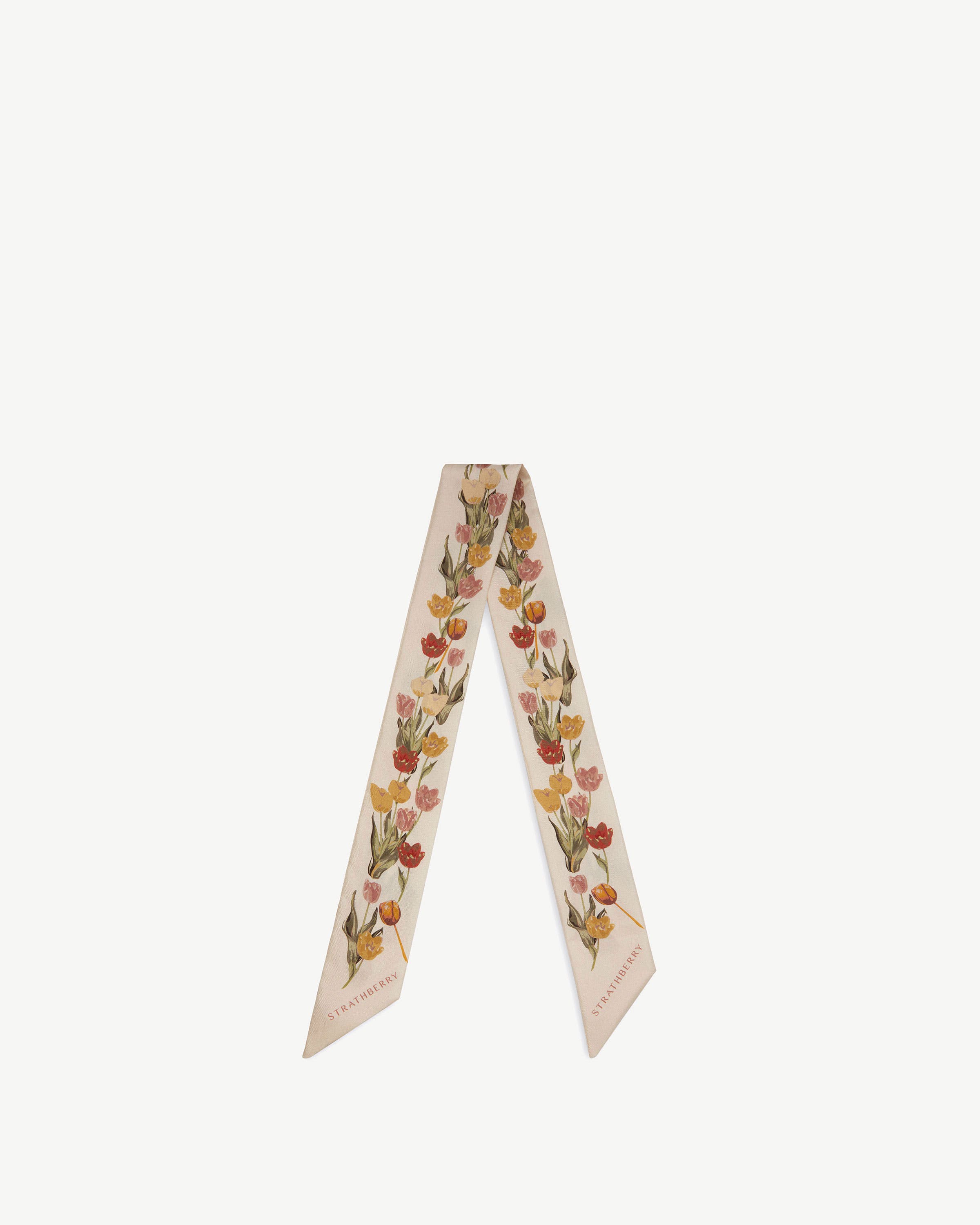 Vanilla silk skinny scarf with brûlée tulip print and Strathberry logo.