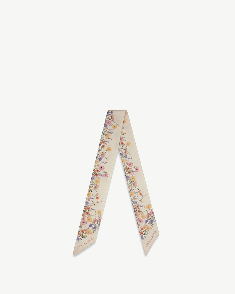 Silk skinny scarf in vanilla with frame floral print and Strathberry wordmark