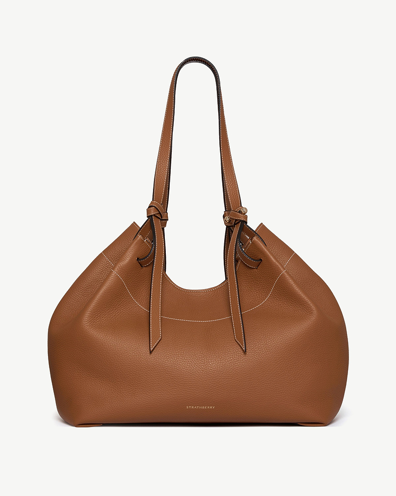 Tan Strathberry Barra tote with knotted handles and pebbled leather finish.