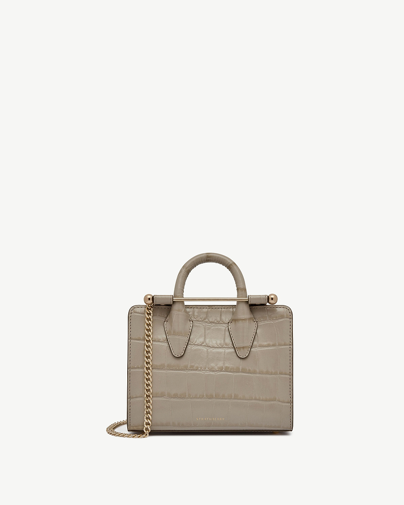 Strathberry nano tote in croc-embossed taupe with top handles and gold chain