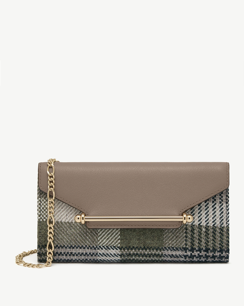 Tartan fabric chain wallet with taupe leather flap and gold bar hardware.