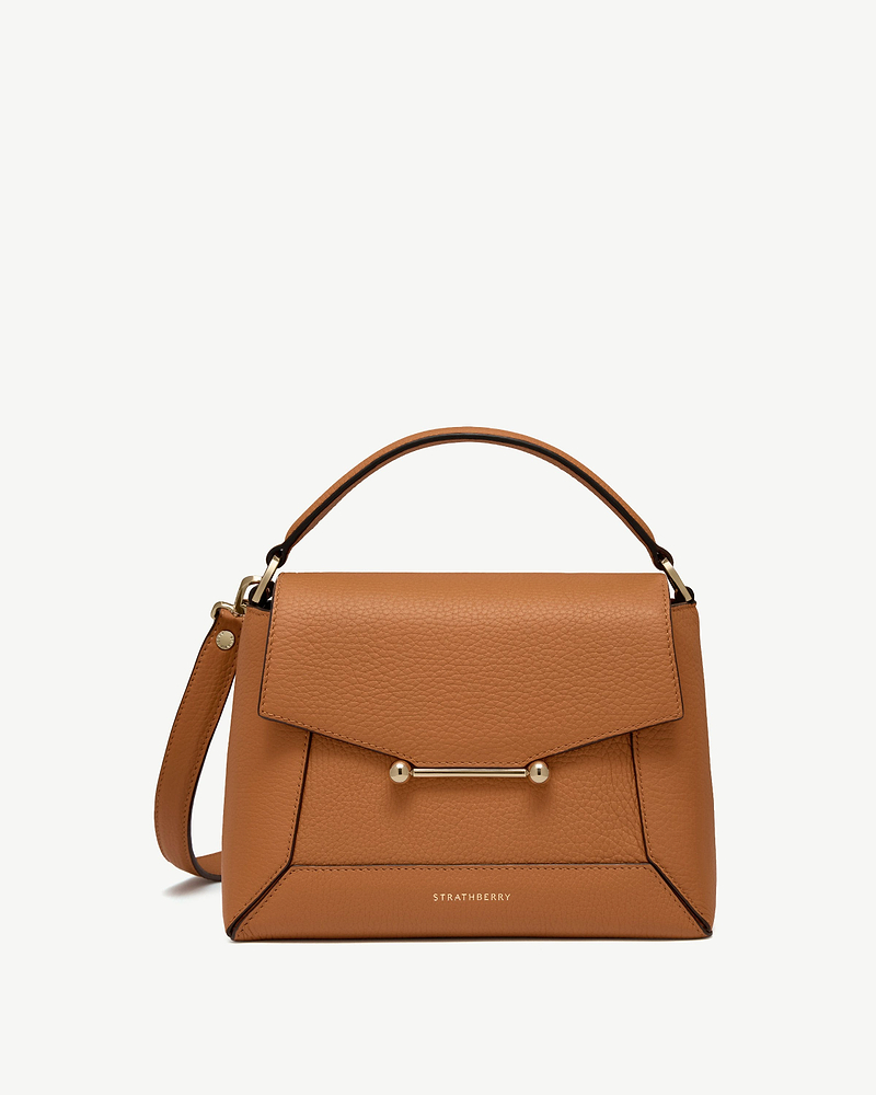 Honey leather mosaic bag with top handle, gold bar detail and Strathberry logo.