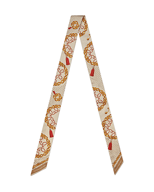 Long silk skinny scarf with caramel diamond chain print on cream background.