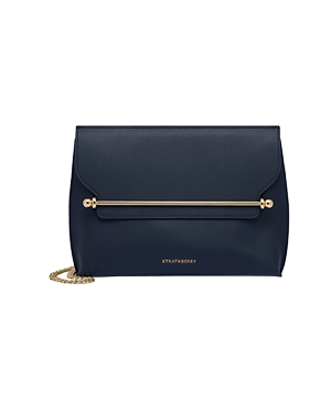 Marine blue Strathberry Stylist bag with gold bar and chain strap.