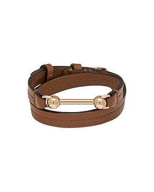 Hazelnut leather double-wrap bracelet with gold bar and spherical end caps.