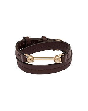 Burgundy double-wrap leather bracelet with gold bar and stud details.
