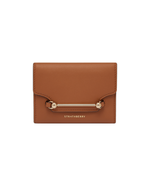 Chestnut Multrees trifold wallet with gold bar hardware and Strathberry logo.
