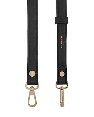 Thin adjustable black leather strap with gold hardware and Strathberry engraved tag.