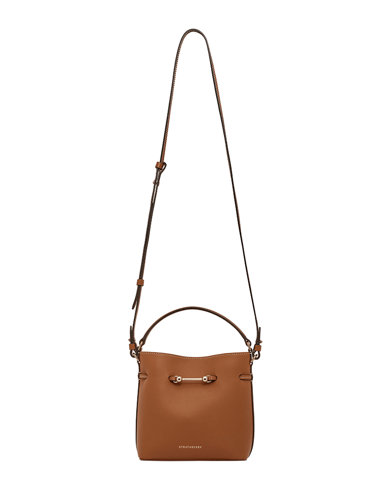 Chestnut Strathberry Corda Bucket Mini with top handle and adjustable shoulder strap.