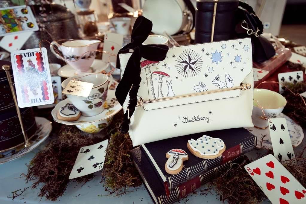 A table topped with lots of cards and other items