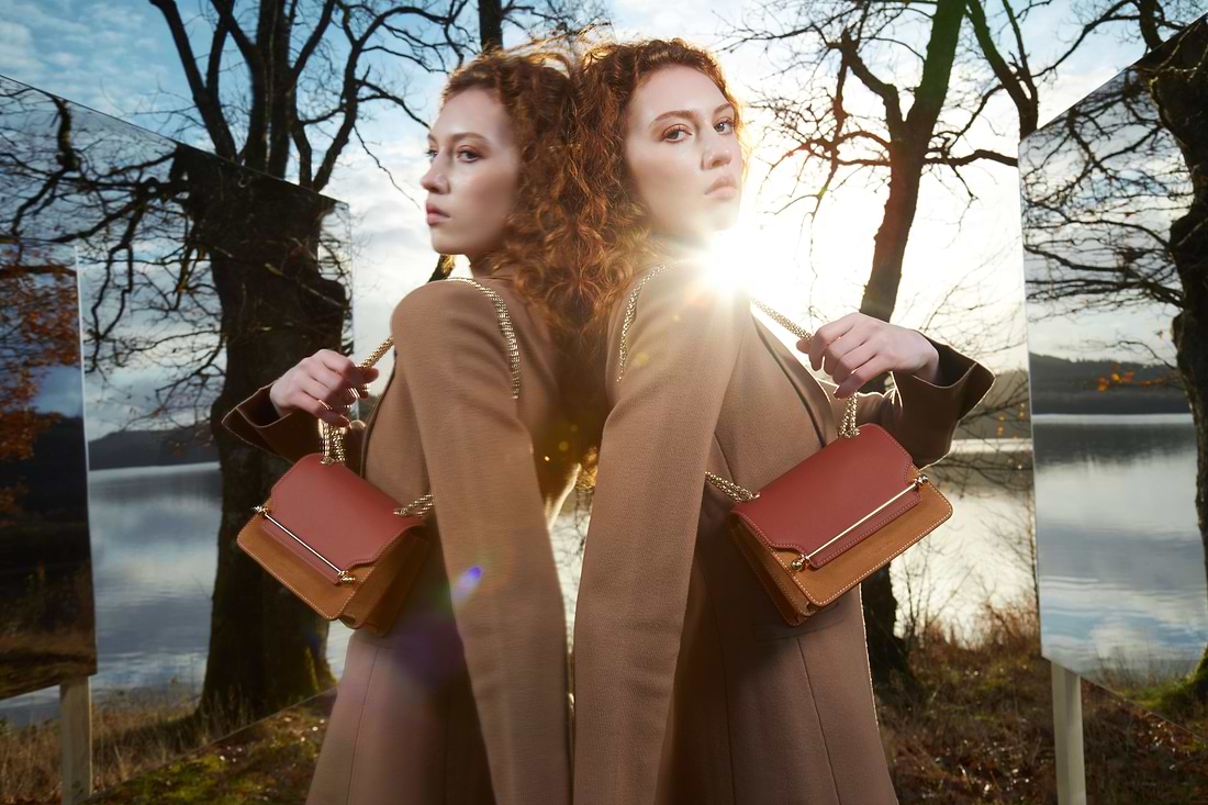A couple of women standing next to each other