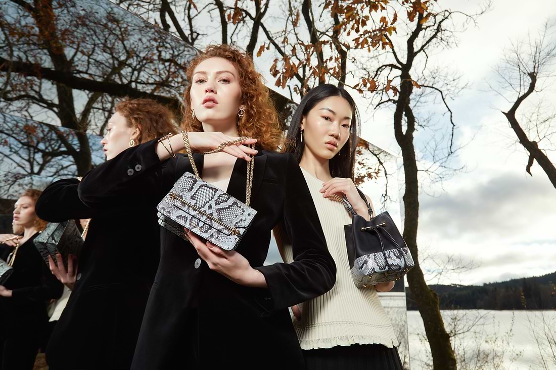 A group of women standing next to each other