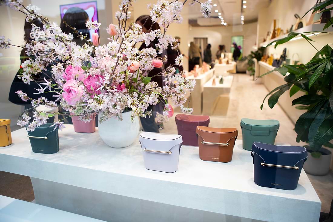 A bunch of vases that are sitting on a table