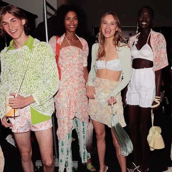 A group of women standing next to each other