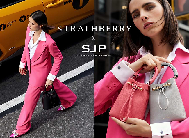 A woman in a pink suit carrying a handbag