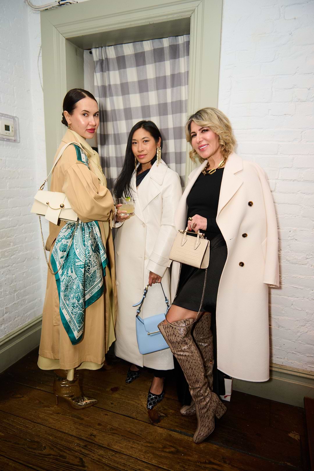 A group of women standing next to each other