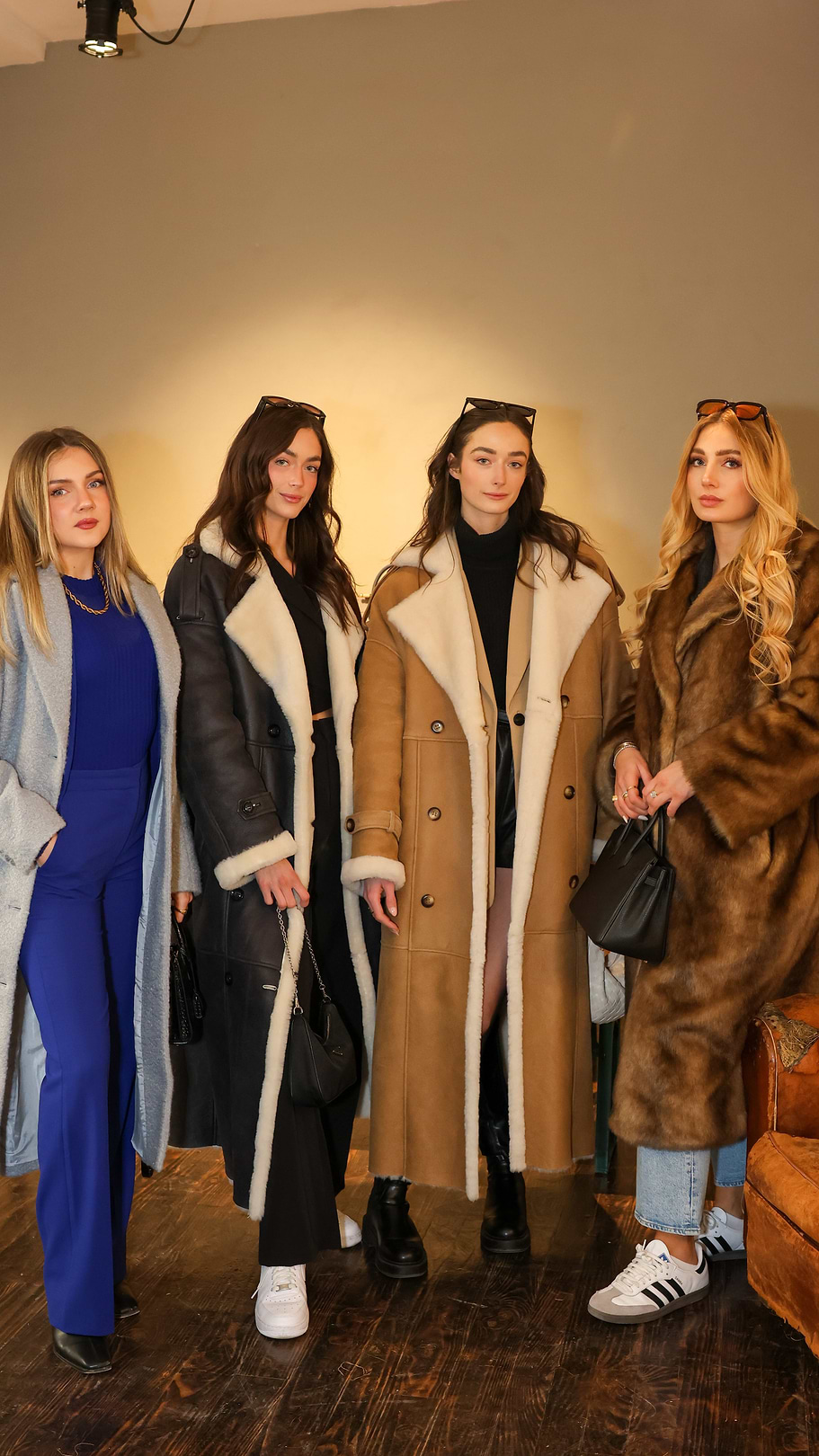 A group of women standing next to each other