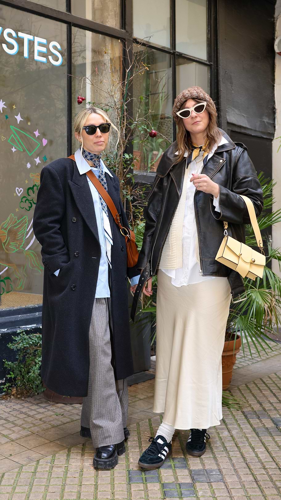 A couple of women standing next to each other