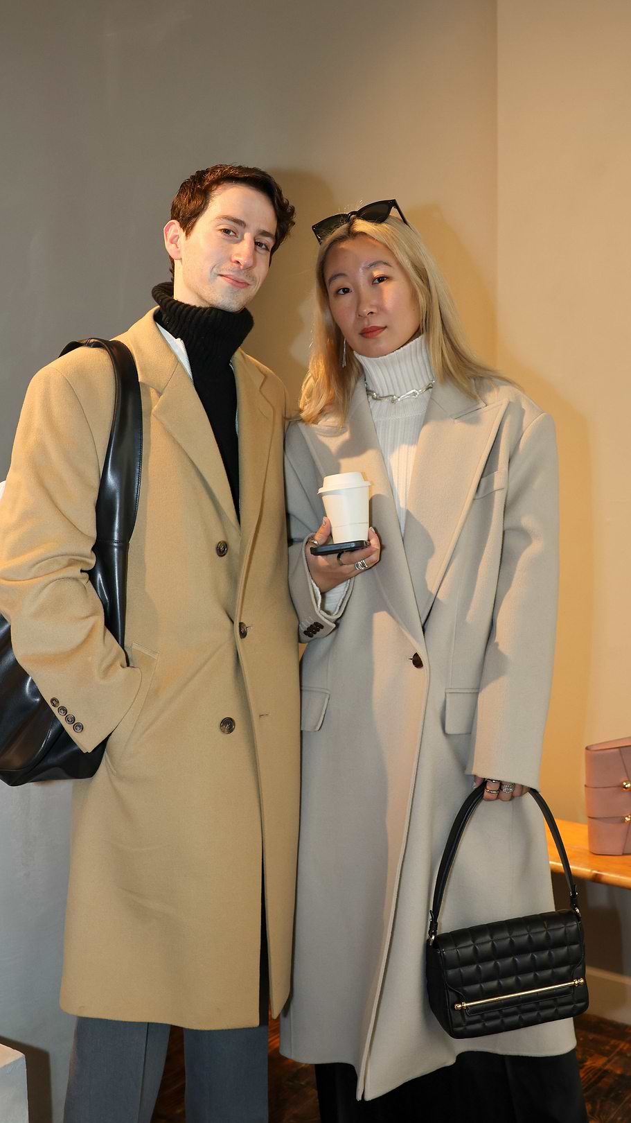 A man and a woman standing next to each other