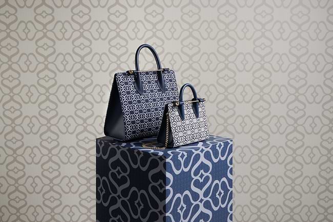 A couple of bags sitting on top of a box
