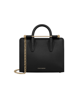 Black Strathberry nano tote with gold bar handle and chain strap.