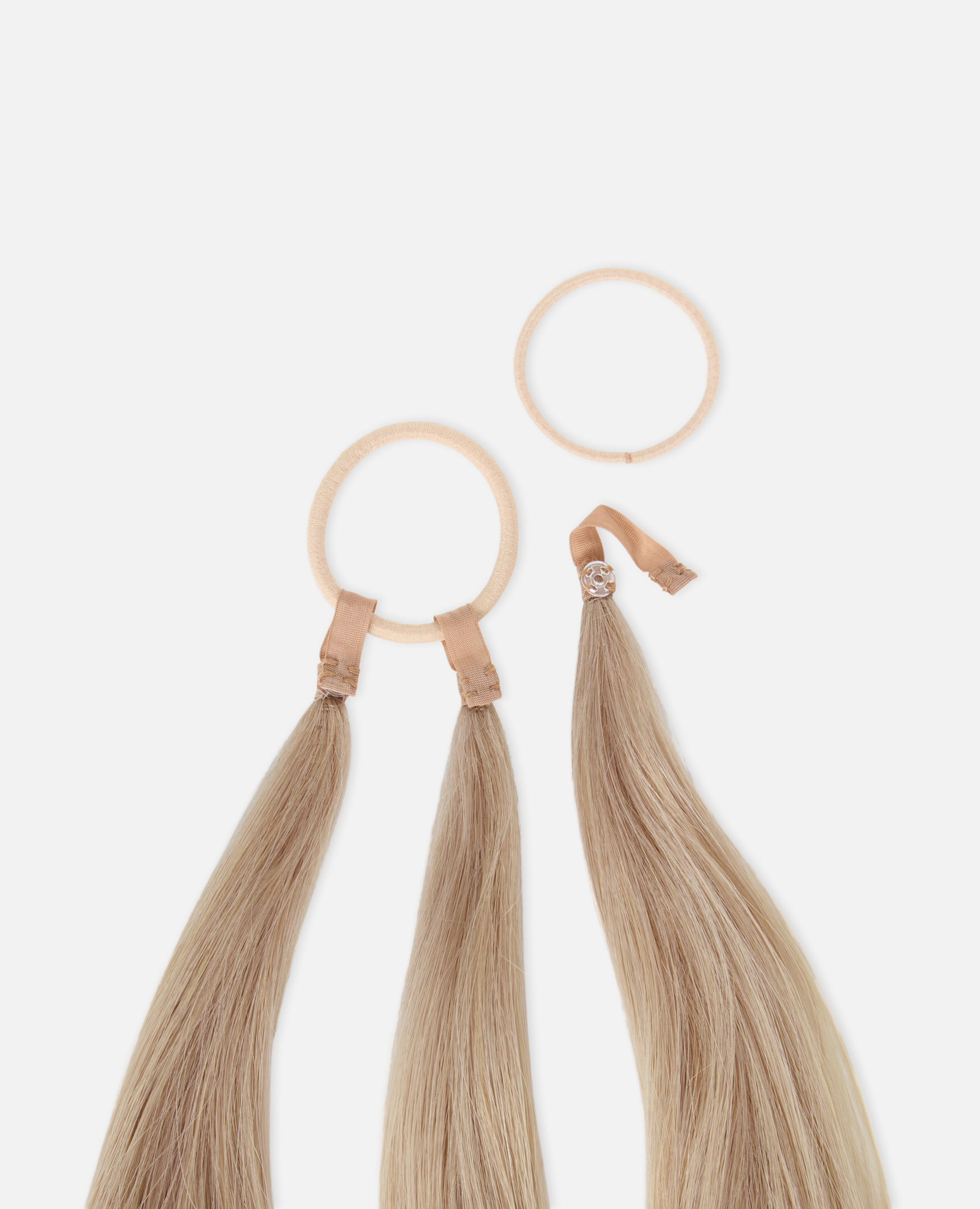 Two blonde hair extensions with loops and a brown band, arranged on a white background.
