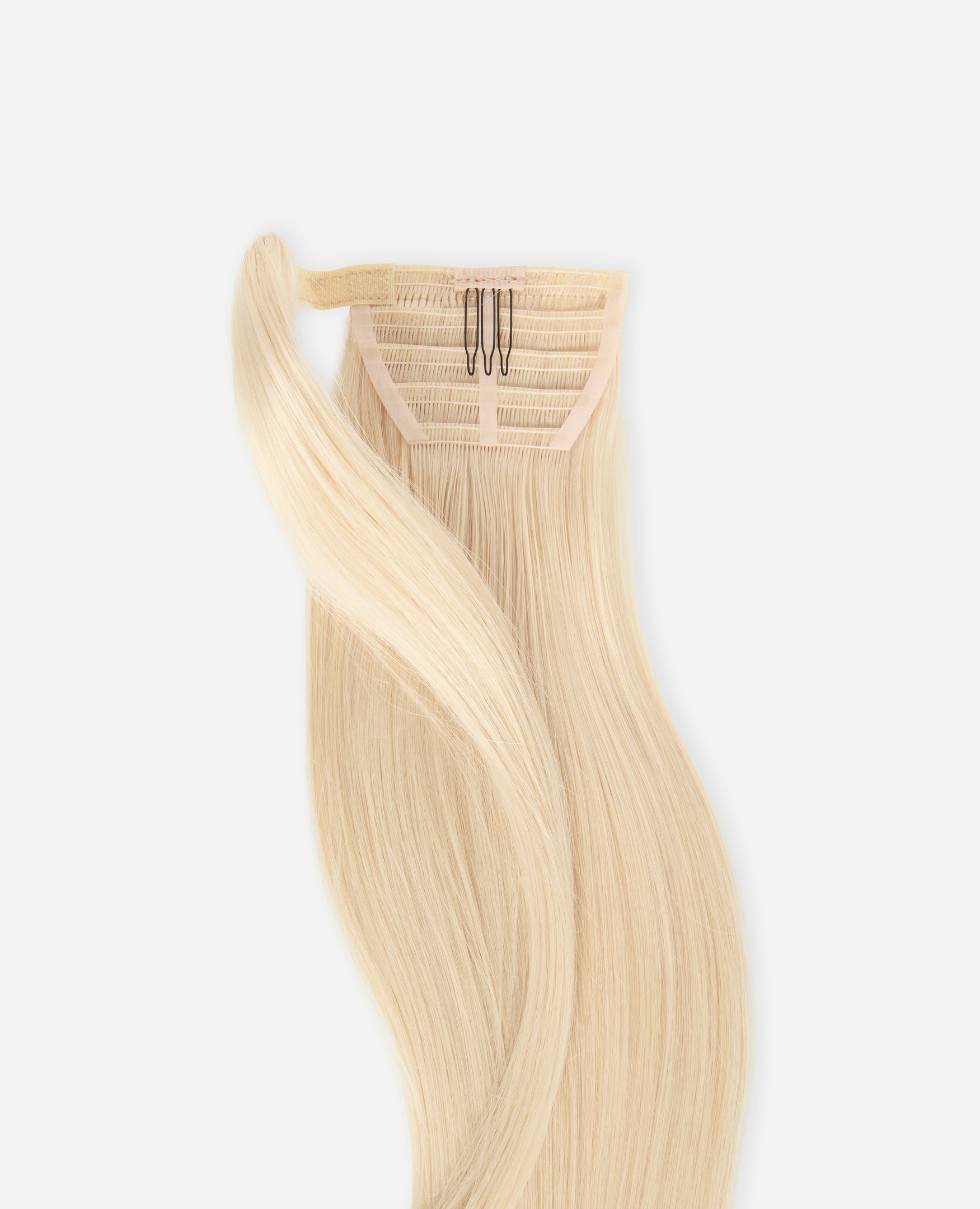 Blonde hair extension with a clip, featuring long, silky strands on a light gray background.