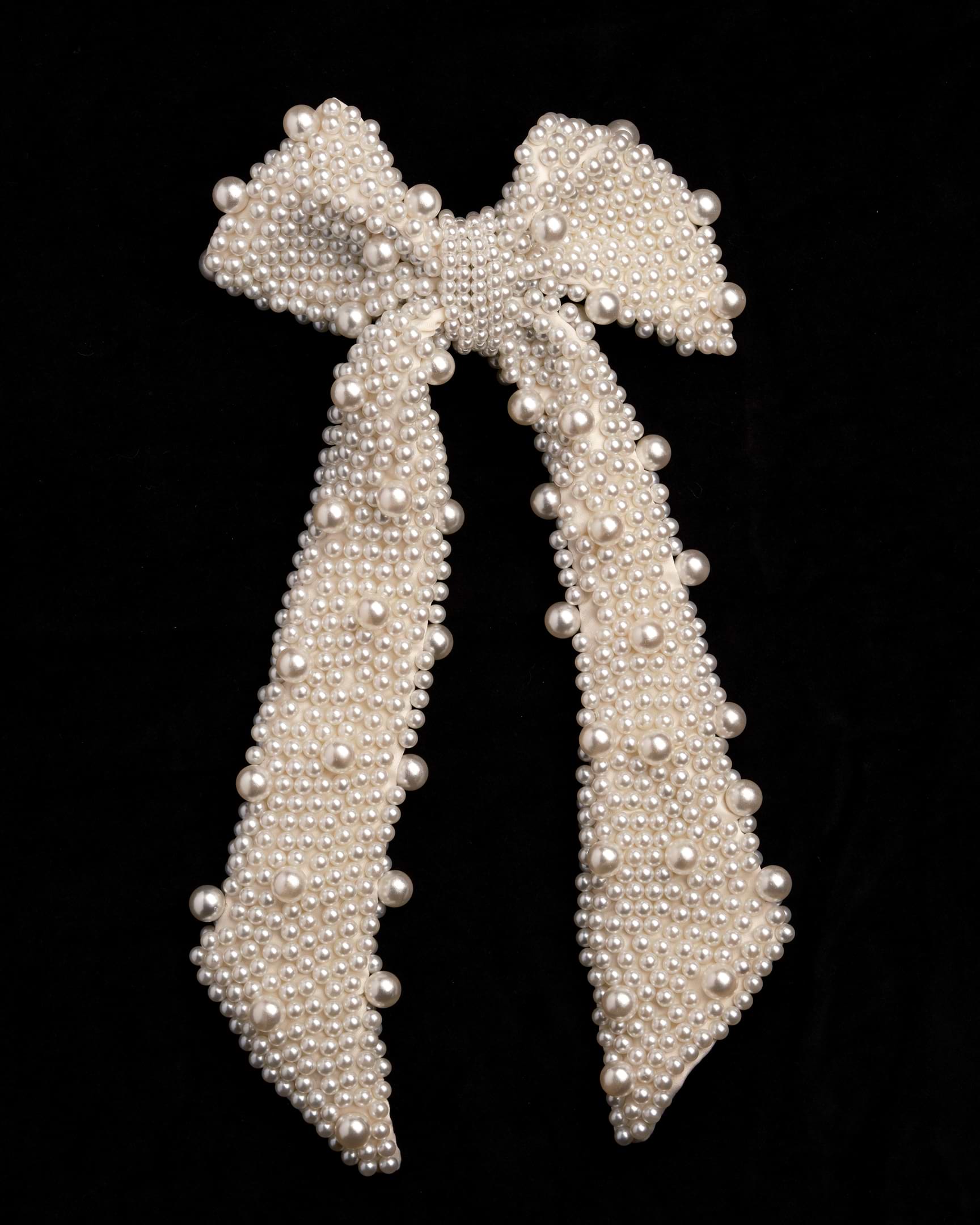 Pearl ribbon on black background