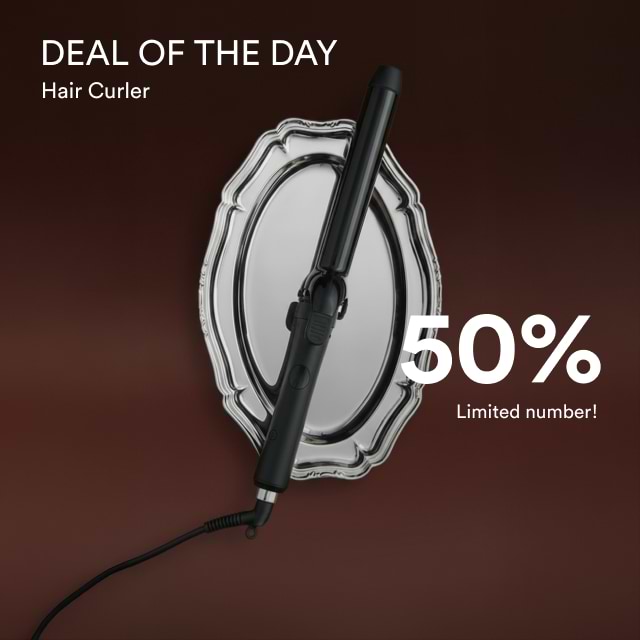 Hair curler displayed on a decorative mirror with text: "Deal of the Day, 50% Limited number!" on a dark background.
