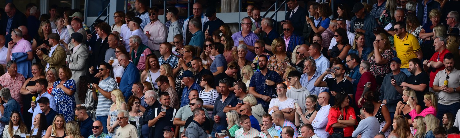 publico en un evento deportivo apostando con Hándicap